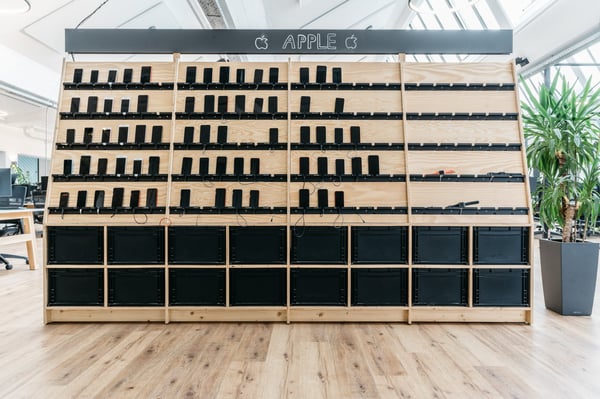 Wall on which many different smartphones stand