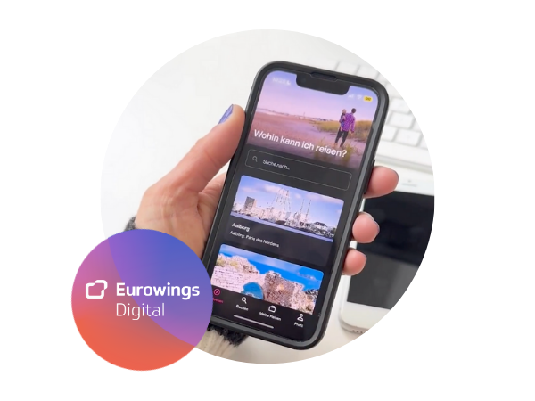 Smartphone in Hand mit Logo von Eurowings digital